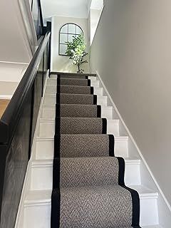 Taupe Carpet stair runner with black taped edge
